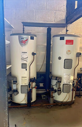 https://kensingtonhotwater.com.au/uploads/2025/06/electric-hot-water-system-10198.jpg